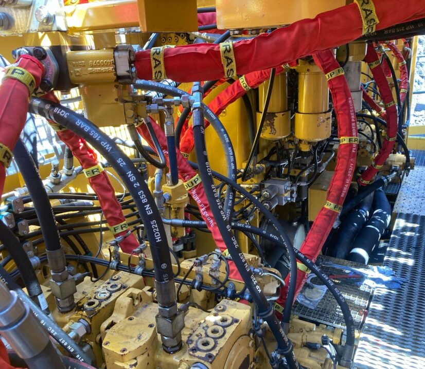 Customised Hydraulic Hose Burst Sleeving protecting Maintainers