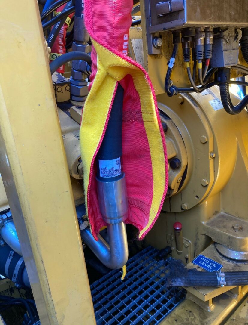 Customised Hydraulic Hose Burst Sleeving protecting Maintainers