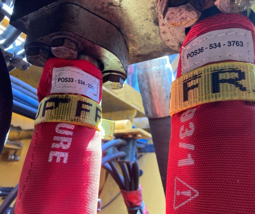 Customised Hydraulic Hose Burst Sleeving protecting Maintainers